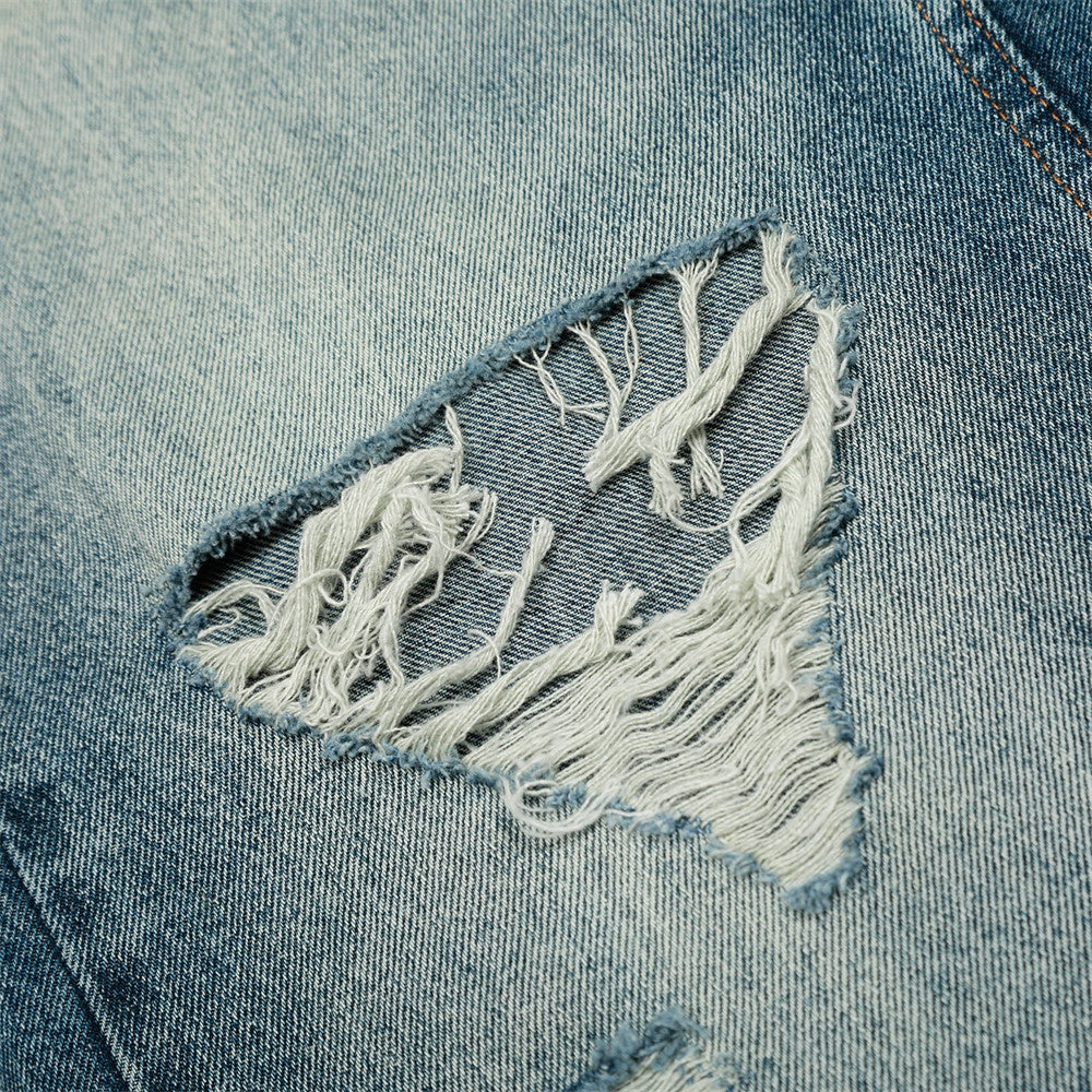 Playful Post-Apocalyptic Distressed Denim Trousers