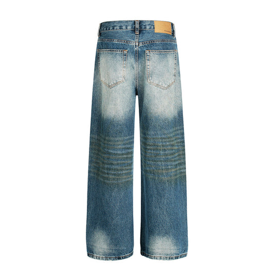 Playful Post-Apocalyptic Distressed Denim Trousers