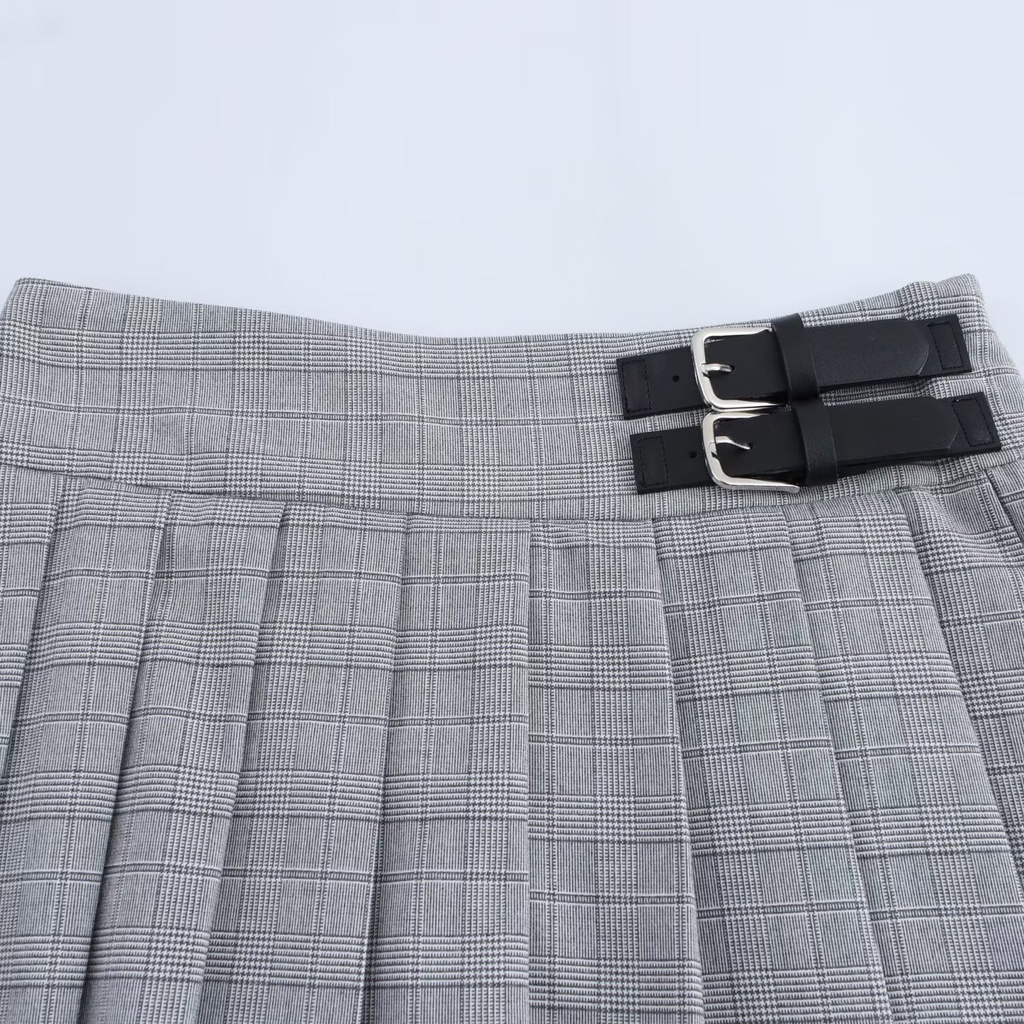 Playful Pleated Plaid Half Skirt with Buckle Decoration