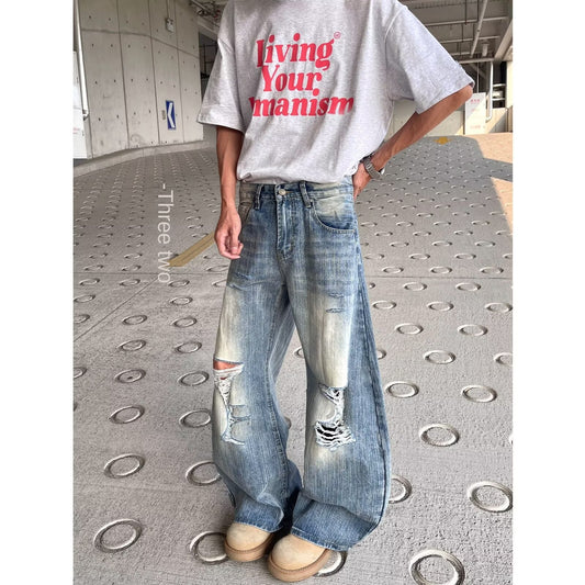 Playful Distressed Denim Wide Leg Pants