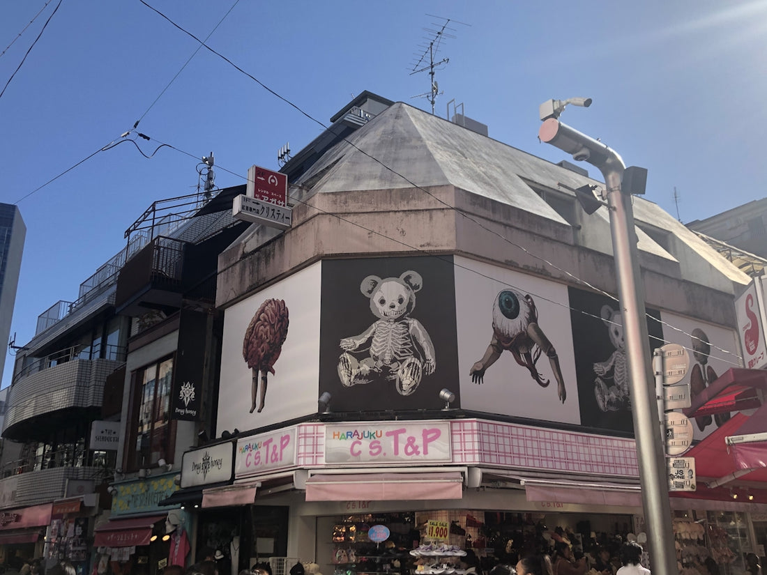 a building with a lot of pictures on the side of it