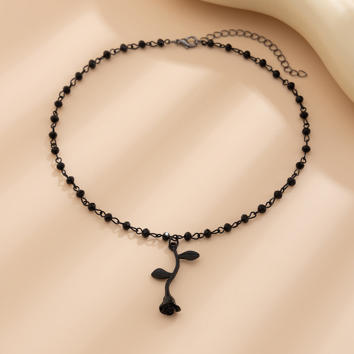 Chic Rose Bead Necklace with Dark Crystal Accents