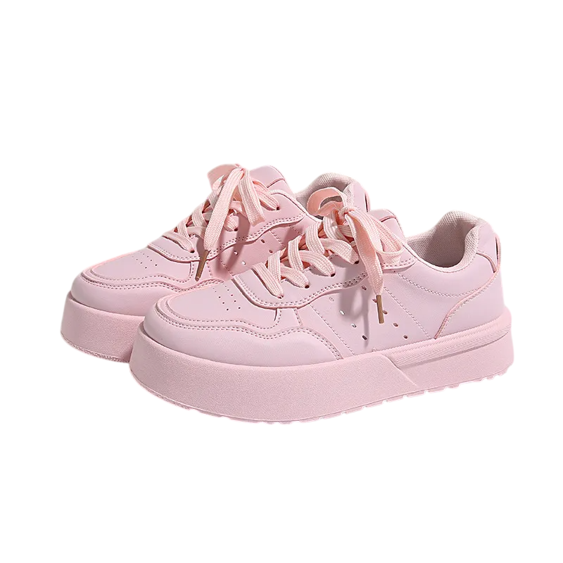 Stylish pink chunky sneakers, made of soft leather with lace-up design for comfort and support.